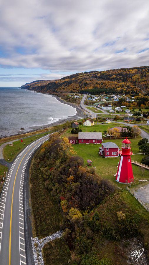 Lighthouse and coastal road from above