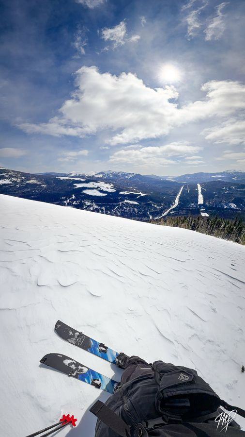 Splitboard break above a valley
